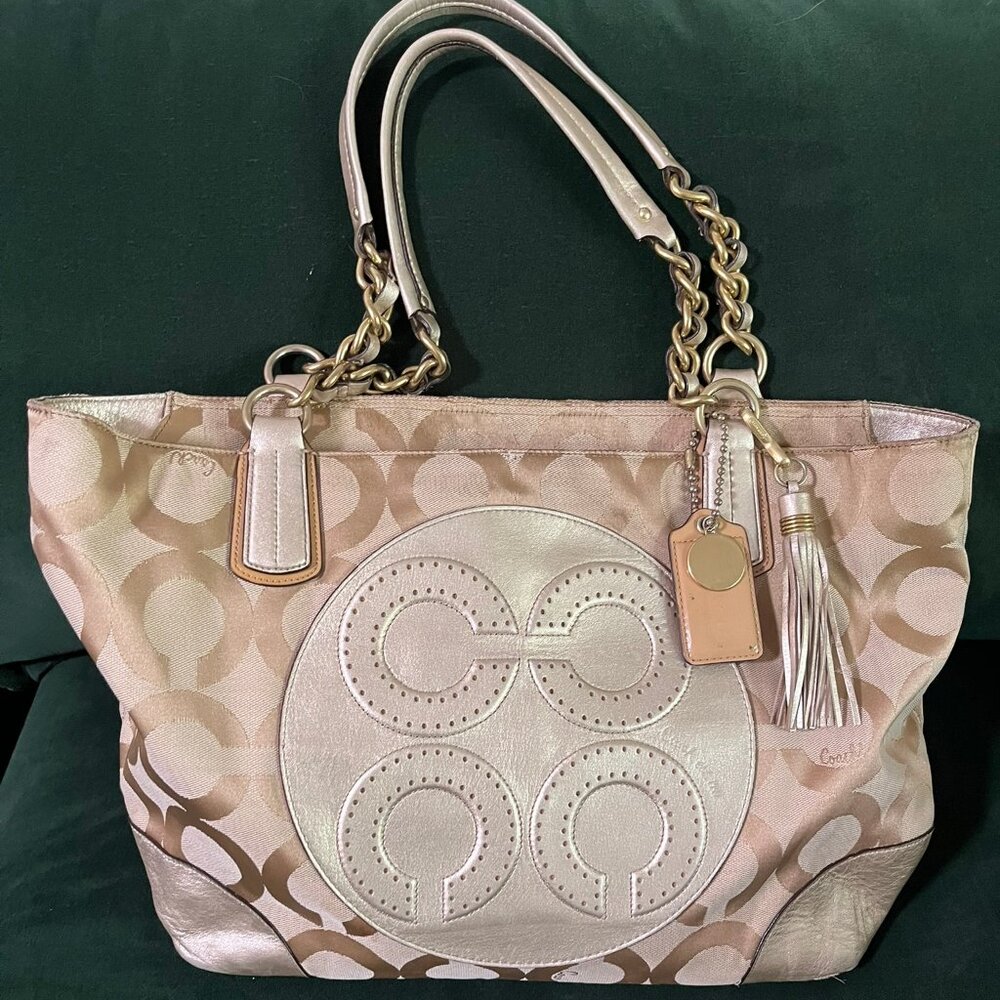 Coach Legacy or Optic Signature Collection series.